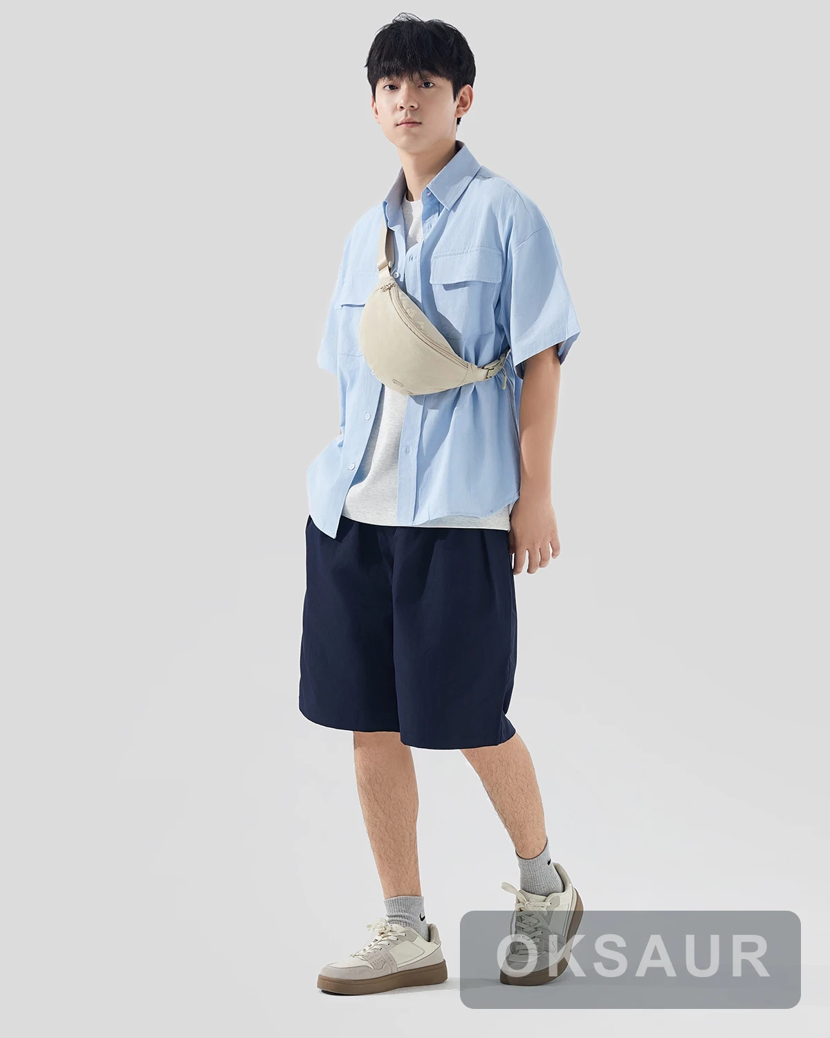 Crescent shoulder bag worn with an adjustable strap