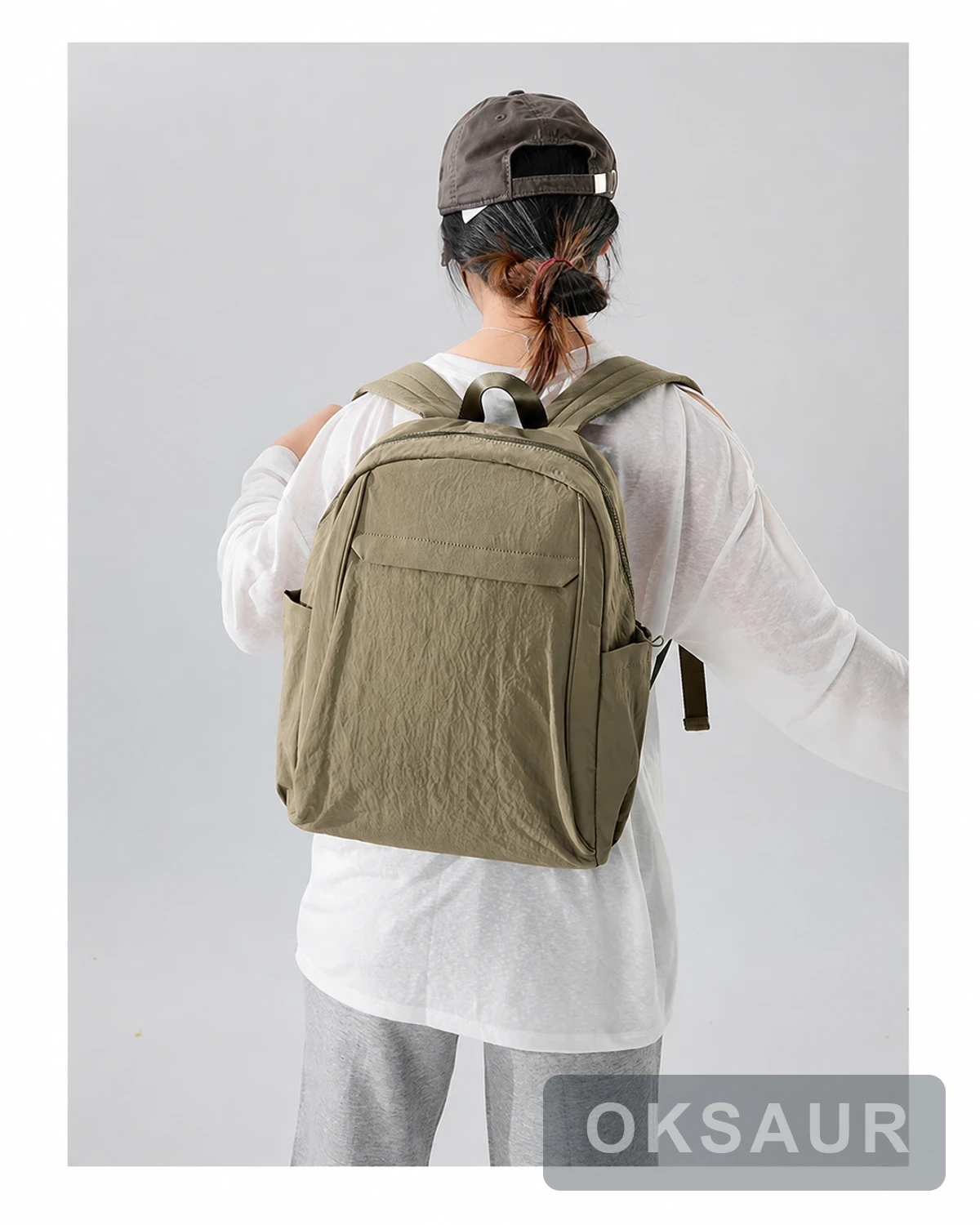Khaki large-capacity backpack shown without supplier branding